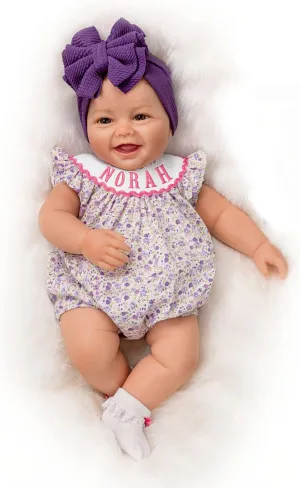 The Ashton-Drake Galleries Lifelike Reborn Norah Baby Doll, 17 inches, Handcrafted RealTouch® Vinyl Collectible by Ping Lau, Purple Bow
